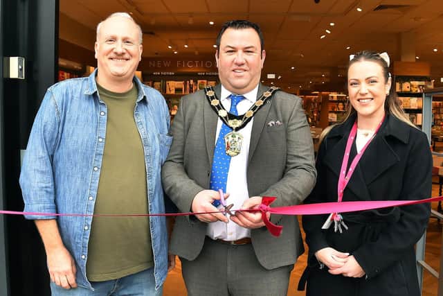 Manager of Waterstones Gainsborough, Russ Thomas, chair of West Lindsey District Council, Coun Matt Boles, and Marshalls Yard centre manager, Melissa Clement
