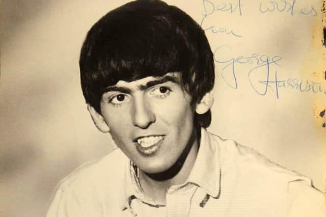 The autographed photo that George Harrison gave to one of the schoolgirls.