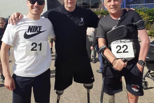 From left - Case manager Jason Chidwick, Paralympian Richard Whitehead and Andrew Pearson.