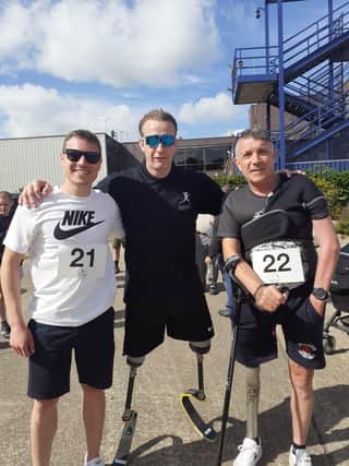 From left - Case manager Jason Chidwick, Paralympian Richard Whitehead and Andrew Pearson.