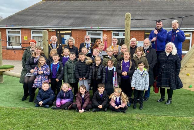 Mablethorpe Academy's staff and pupils with Mayor Steve Holland (back centre).