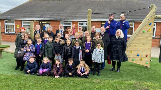 Mablethorpe Academy's staff and pupils with Mayor Steve Holland (back centre).