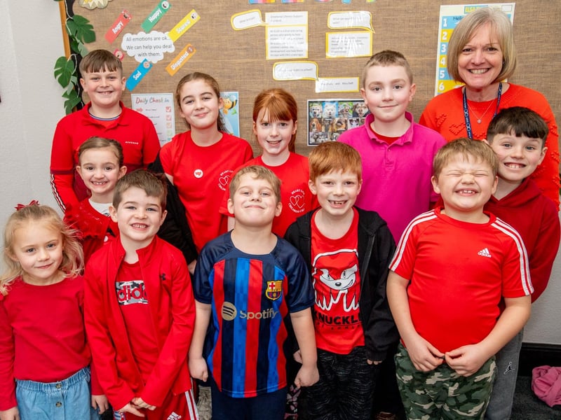 Pupil William Hough, front, centre, pictured with other pupils and staff pictured at their heart day fundraiser for charity.