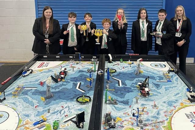 We are the champions! The Academy’s winning team who will compete in the national finals with Miss Hill (right) and Miss Clayton.