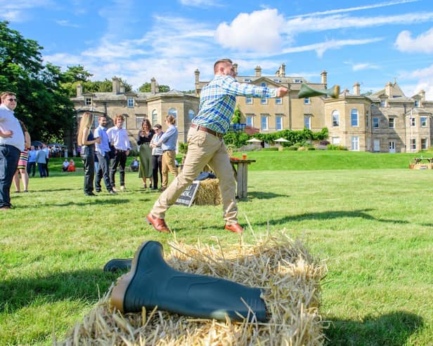 Welly wanging in full swing at the Lincolnshire Chamber of Commerce Summer Garden Party at Wellingore Hall, Wellingore. Photo:  Chris Vaughan Photography