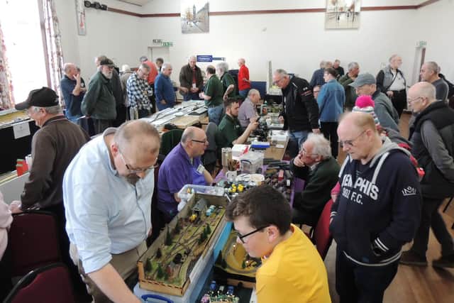 One of the club's previous charity model makers shows.