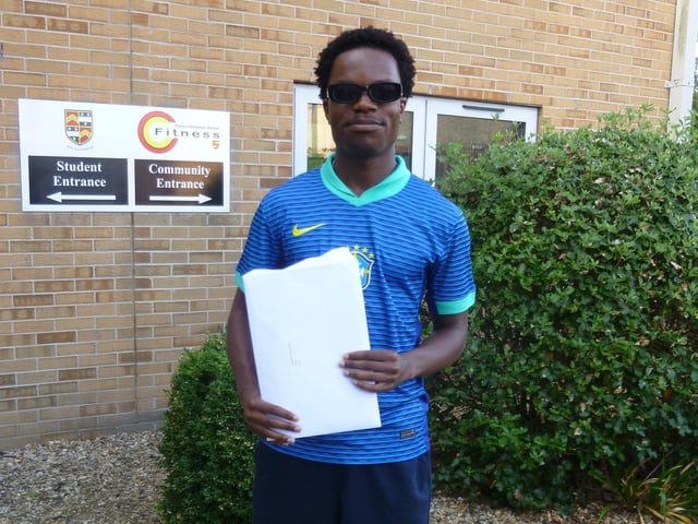 Iheanyi with his results at Carre's. Photo: Robert Carre Trust