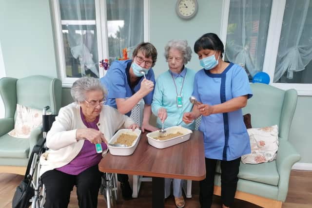 Enjoying some harvest baking are Doreen Wheat, Louise Rider, Joyce Knight and Aida.