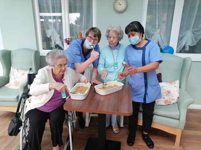 Enjoying some harvest baking are Doreen Wheat, Louise Rider, Joyce Knight and Aida.