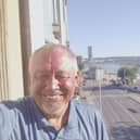 Paul Bargh on the balcony of their Air B&B in Belgrade.