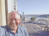 Paul Bargh on the balcony of their Air B&B in Belgrade.