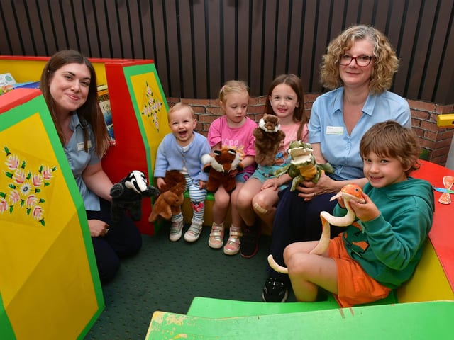 Crafts and storytelling at Sleaford Library on Saturday. L-R Charlotte Harris - Sleaford library manager, 18-month-old Tilly Padley, Clara Hewitt 4, Emily Hewitt 6, Jo Hubbert - senior library assistant, Peter Freeman 5