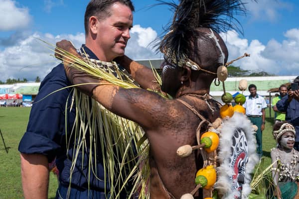 Capt. Joseph Dransfield receives a ceremonial Papua New Guinea necklace. (U.S. Navy photo by Ensign Madison Kwok)