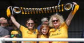 Boston United fans saw their side finally clinch promotion back to the National League after a play-off final win at Brackley.