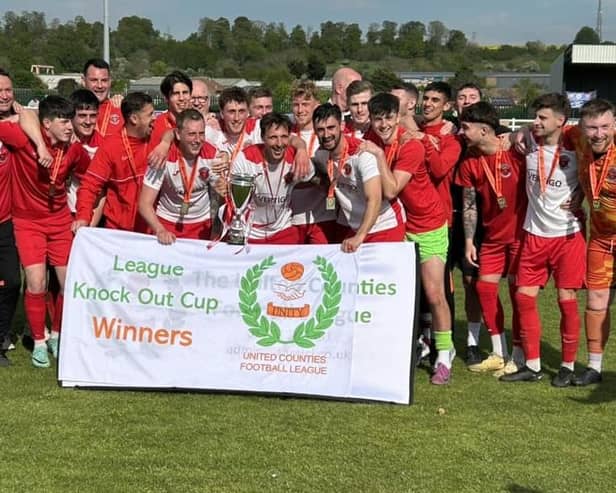 Skegness Town's players celebrate their cup win. Photo by David Johnson.