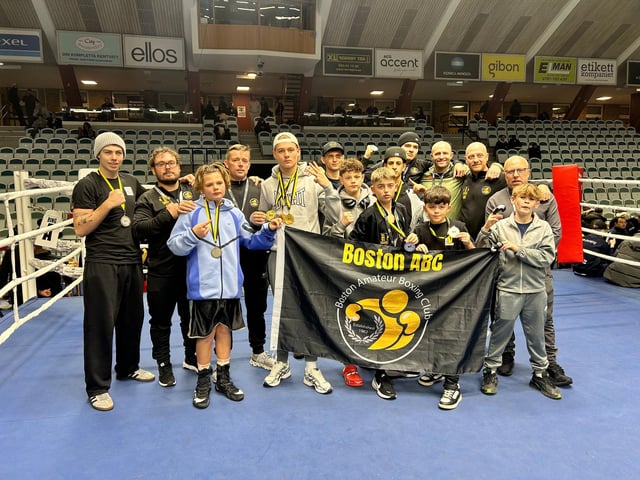 Boston ABC boxers posing with their medals