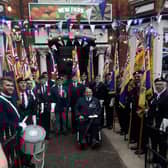 The Skegness branch of the Royal British Legion celebrating the Queen's Platinum Jubilee. The Union Flag is now flying half-mast.