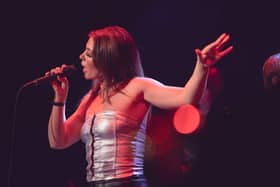 Hattie Johnson performing in Revisiting Amy