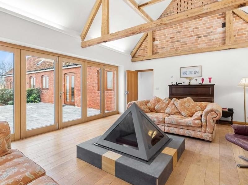 The living room with log-burner feature.