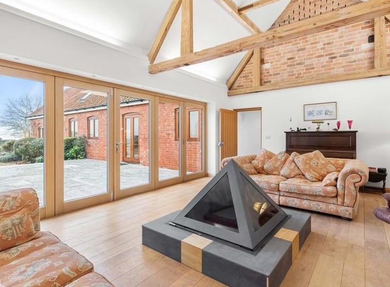 The living room with log-burner feature.