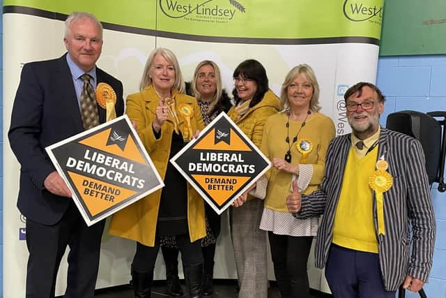 The Liberal Democrats celebrate their election success.