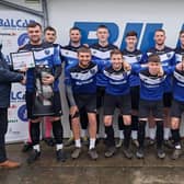 Louth receive their Team of the Month award from league vice-chairman Ian Weston.