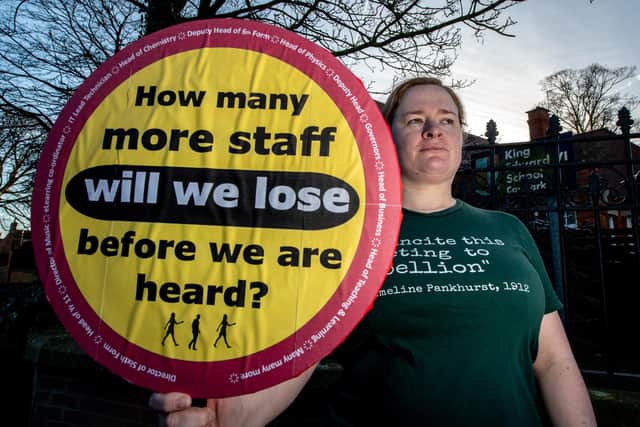 A protestor on the picket line at King Edward VI Grammar School. Photo: John Aron