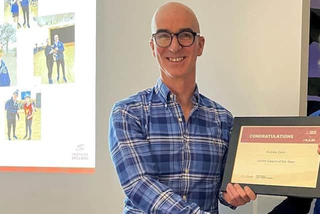 Andrew being presented with his award.