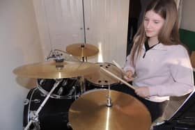 Abbie Day, 14, is preparing for a 12-hour drum-athon fundraiser.
