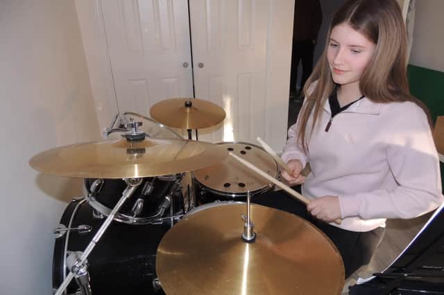 Abbie Day, 14, is preparing for a 12-hour drum-athon fundraiser.