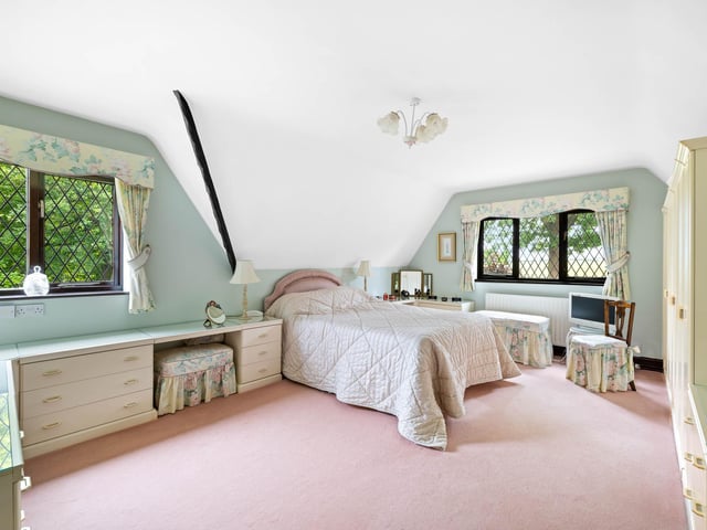 One of the four bedrooms.