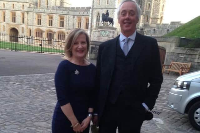 Francis and Gail Dymoke attending a reception at Windsor Castle.