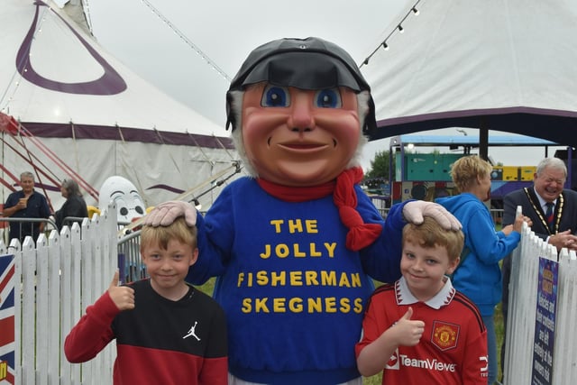 The Jolly Fisherman welcoming excited youngsters to the circus.