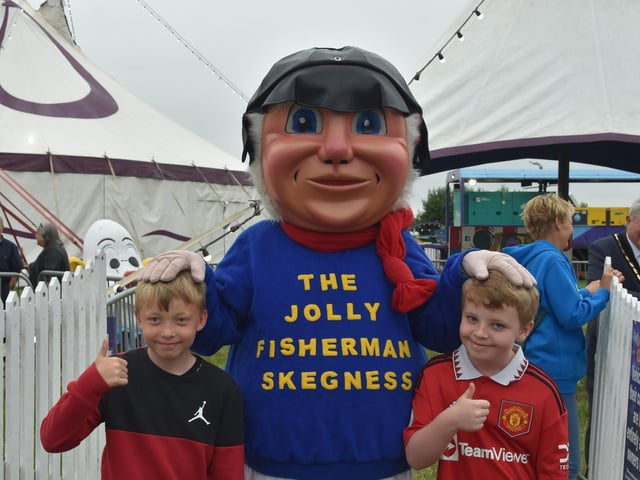 The Jolly Fisherman welcoming excited youngsters to the circus.
