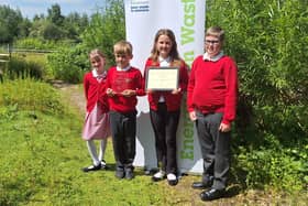 Members of the Grow with Nature Club. Pictured (from left) Ramona Romanova, eight, Arturas Butnorius, nine, Julia Los, 11, and George Watson, 11.