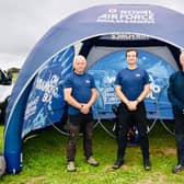 The team pictured with their paramotors.