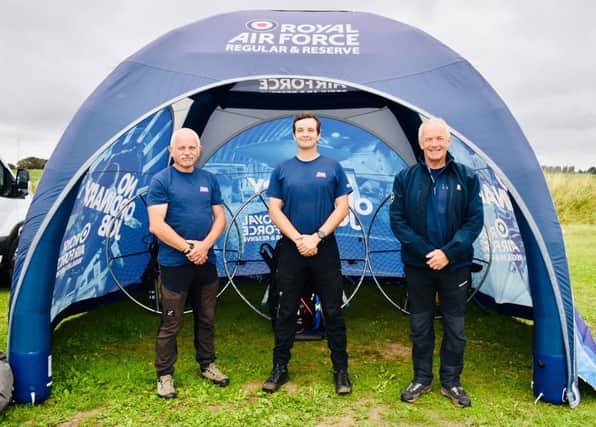 The team pictured with their paramotors.