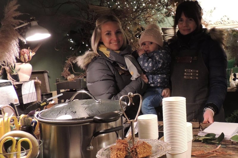 Petal and Stalk florists and gifts were serving cakes and mulled wine. from left - owner Hannah North, son Bobby North, aged two, and Pippa Altus.