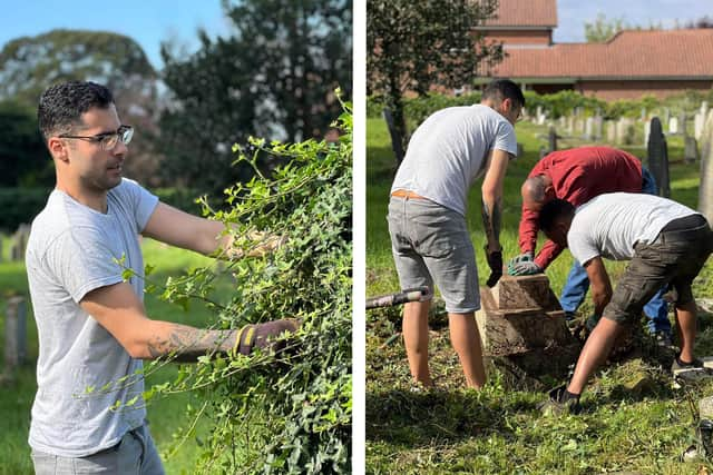 Amir cuts back some ivy, left, and with two other volunteers who helped to tidy up the church grounds.