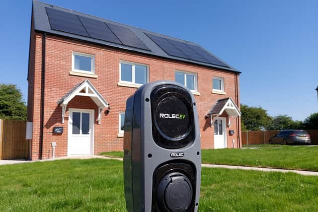 Electric car chargers fitted outside the new homes in Potterhanworth as part of the green effort.