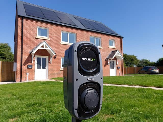 Electric car chargers fitted outside the new homes in Potterhanworth as part of the green effort.