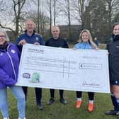 LWGFL representatives accept the sponsorship cheque from Quickline Communications.
