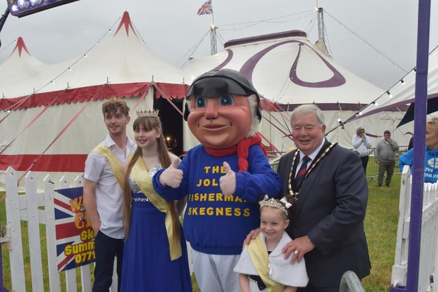 Mayor of Skegness Coun Pete Barry with carnival royalty and the Jolly Fisherman.