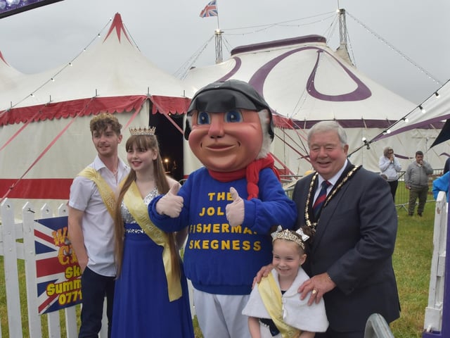 Mayor of Skegness Coun Pete Barry with carnival royalty and the Jolly Fisherman.