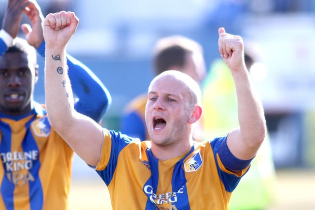 Skipper Adam Murray acknowledges the travelling fans at the final whistle.