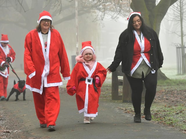 Action from this year's Boston Santa Run.