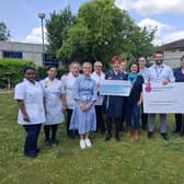 Leanne and Lewis Morgan present donations to staff from Bostonian Ward, ULH Charity and Macmillan Nurses.