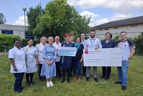 Leanne and Lewis Morgan present donations to staff from Bostonian Ward, ULH Charity and Macmillan Nurses.
