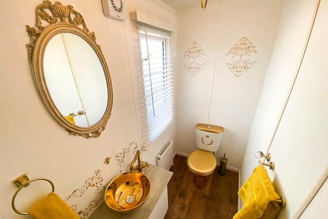 A gold-painted bathroom.