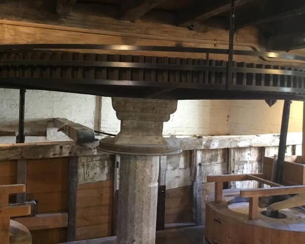 Cogglesford Mill is grinding flour for the community grocery store, supplied by a local grain merchant.